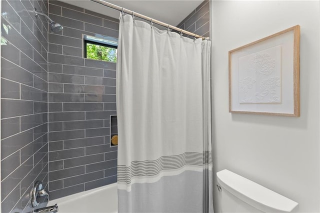 full bath featuring shower / bath combo and toilet