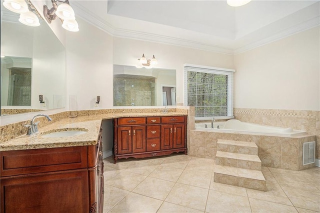 bathroom featuring a bath, visible vents, a sink, and a stall shower