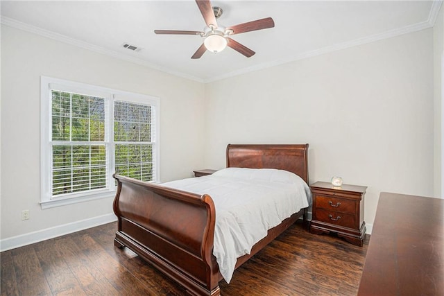 bedroom with ceiling fan, ornamental molding, visible vents, wood-type flooring, and baseboards