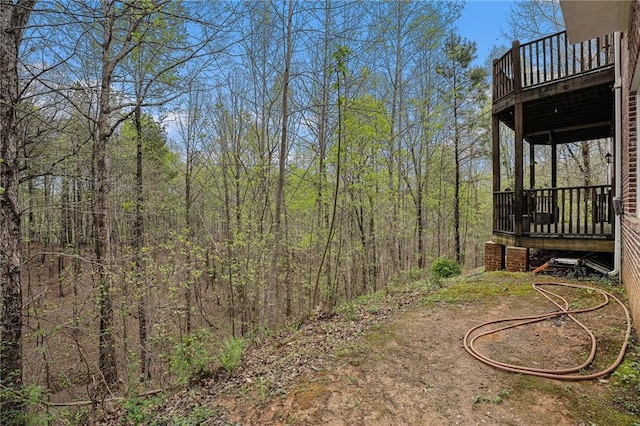 view of yard featuring a view of trees