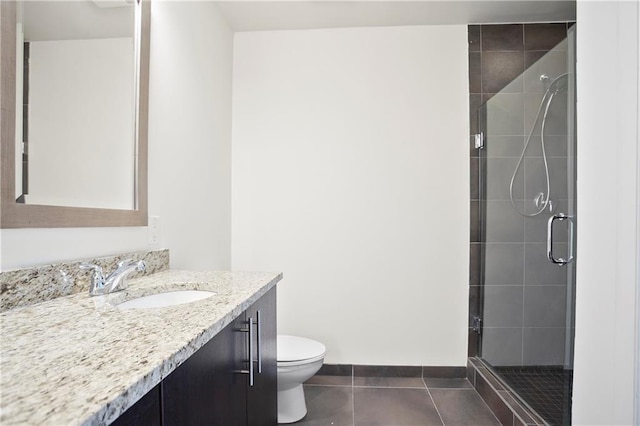 1080 Peachtree St NE Unit 804, Atlanta, GA 30309 - bathroom with vanity, tile patterned floors, and a shower stall