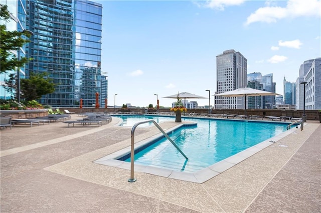 1080 Peachtree St NE Unit 804, Atlanta, GA 30309 - community pool featuring a patio and a view of city