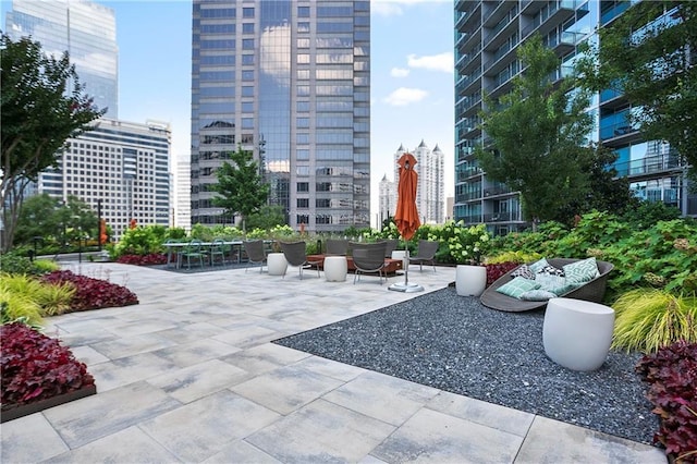 1080 Peachtree St NE Unit 804, Atlanta, GA 30309 - view of community featuring a city view and a patio area