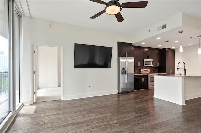 1080 Peachtree St NE Unit 804, Atlanta, GA 30309 - unfurnished living room featuring dark wood-style flooring, ceiling fan, and recessed lighting