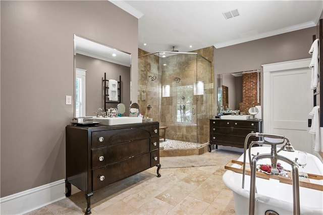 full bath featuring crown molding, visible vents, two vanities, a shower stall, and a sink