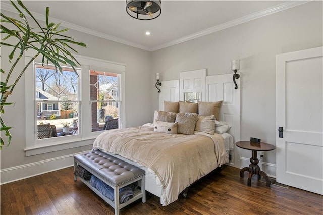 bedroom featuring baseboards, ornamental molding, recessed lighting, and wood finished floors