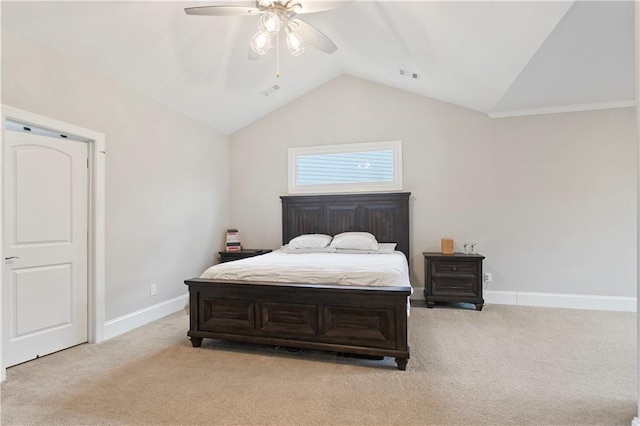 carpeted bedroom featuring ceiling fan and vaulted ceiling