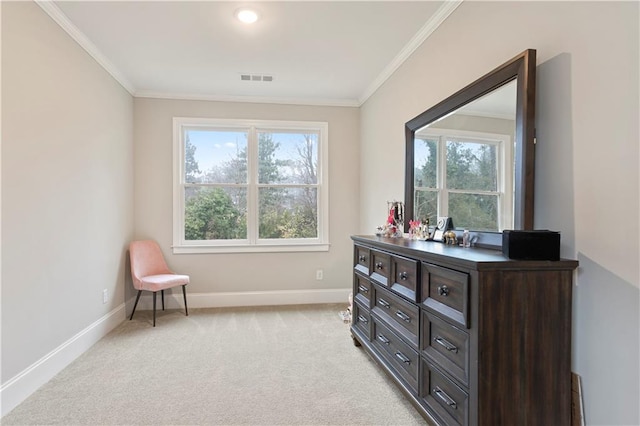 sitting room featuring crown molding and light carpet