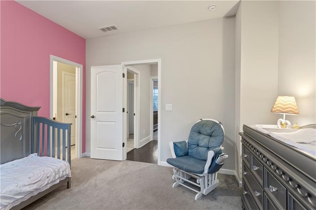 bedroom with dark carpet