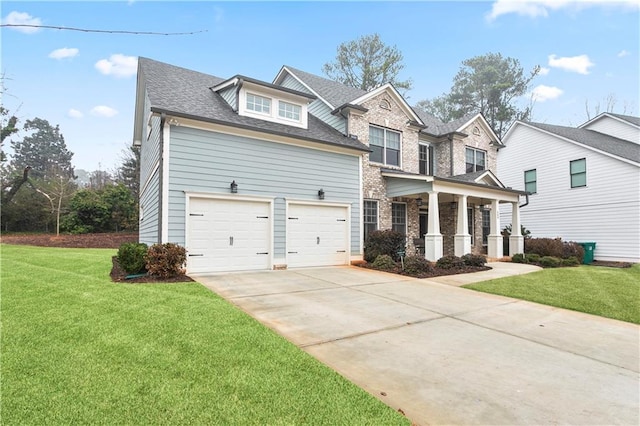 craftsman-style home featuring a front lawn and a garage