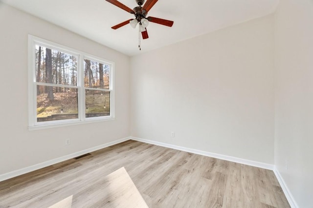 unfurnished room with light hardwood / wood-style floors and ceiling fan