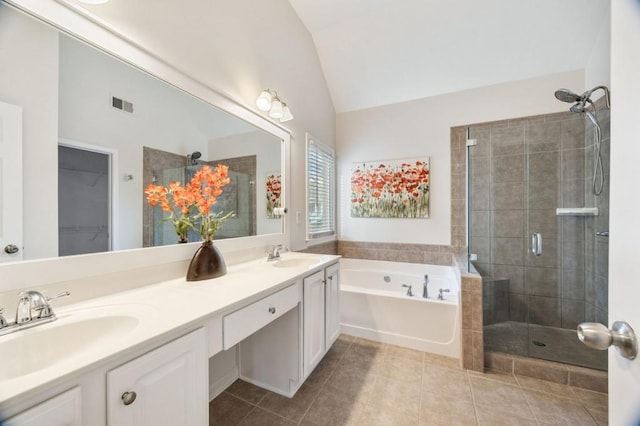 bathroom featuring separate shower and tub, vanity, tile patterned flooring, and vaulted ceiling