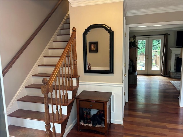 3641 Bramblewood Way, Marietta, GA 30062 - stairs with crown molding, hardwood / wood-style floors, a brick fireplace, and french doors