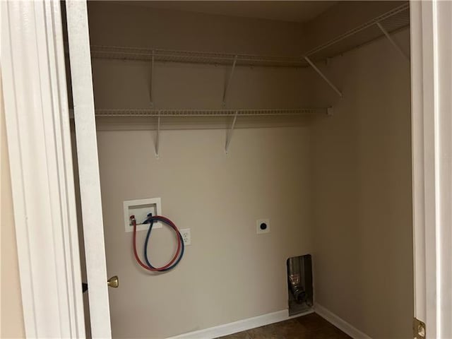 laundry area with hookup for a washing machine, laundry area, baseboards, and hookup for an electric dryer