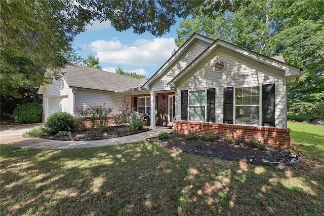 64 River Mist Cir, Jefferson, GA 30549 - single story home with brick siding, an attached garage, and a front yard