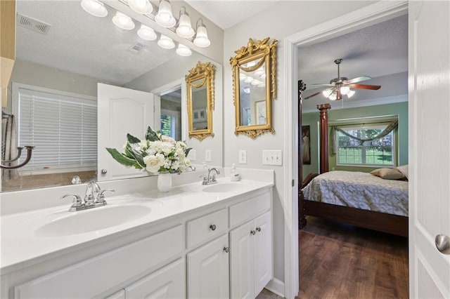 64 River Mist Cir, Jefferson, GA 30549 - full bathroom with connected bathroom, double vanity, wood finished floors, and ceiling fan