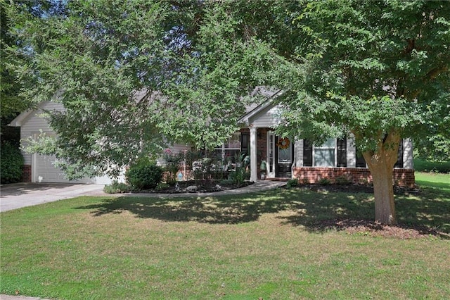 64 River Mist Cir, Jefferson, GA 30549 - obstructed view of property featuring brick siding and a front lawn