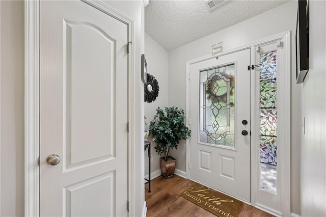 64 River Mist Cir, Jefferson, GA 30549 - entryway featuring a textured ceiling and wood finished floors