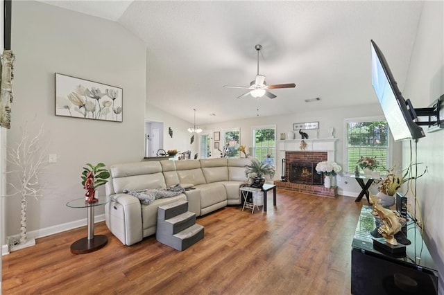 64 River Mist Cir, Jefferson, GA 30549 - living room with ceiling fan, vaulted ceiling, wood finished floors, and a fireplace