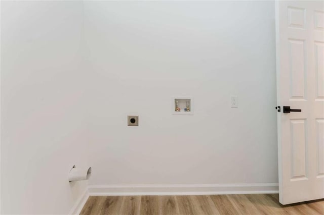 laundry room featuring hookup for a washing machine, light wood-type flooring, and hookup for an electric dryer