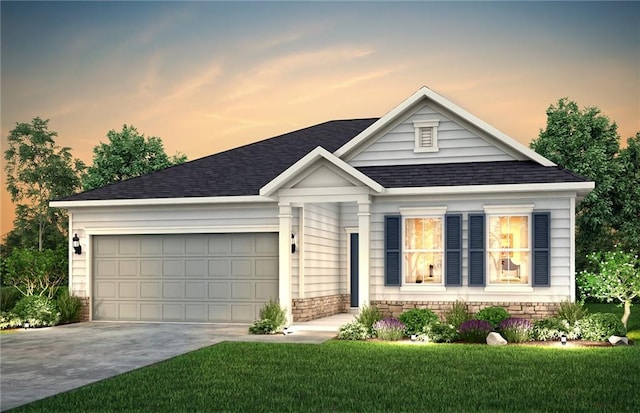 view of front of home featuring driveway, an attached garage, a front yard, and roof with shingles