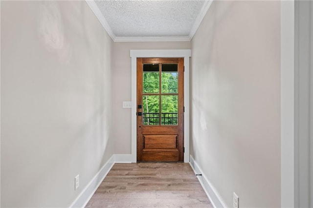 136 Ridgecrest Dr, Ball Ground, GA 30107 - entryway featuring a textured ceiling, crown molding, wood finished floors, and baseboards