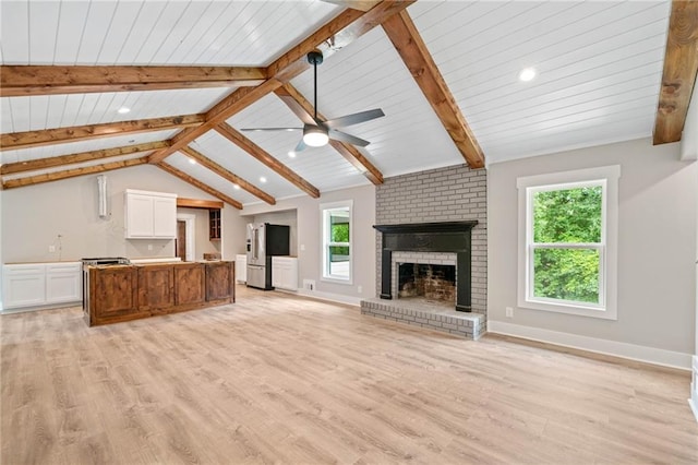 136 Ridgecrest Dr, Ball Ground, GA 30107 - unfurnished living room featuring light wood finished floors, plenty of natural light, ceiling fan, a fireplace, and recessed lighting
