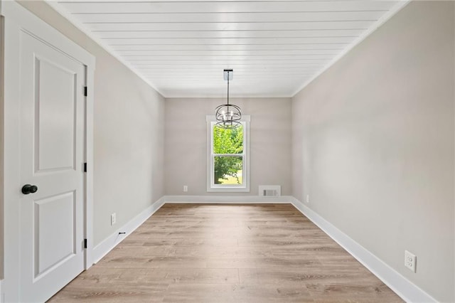 136 Ridgecrest Dr, Ball Ground, GA 30107 - empty room featuring light wood-type flooring, a chandelier, baseboards, and ornamental molding