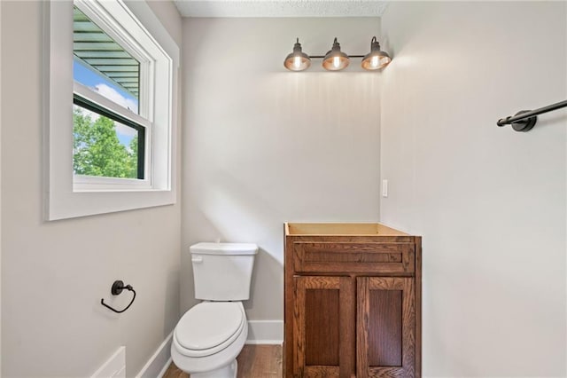 136 Ridgecrest Dr, Ball Ground, GA 30107 - bathroom with toilet and baseboards
