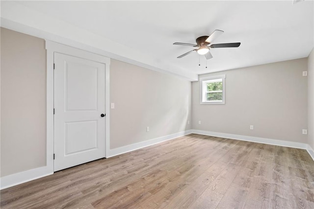 136 Ridgecrest Dr, Ball Ground, GA 30107 - unfurnished room with light wood-style flooring, ceiling fan, and baseboards