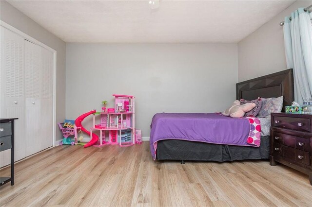 365 Winding River Dr Unit # E, Atlanta, GA 30350 - bedroom with wood finished floors and baseboards