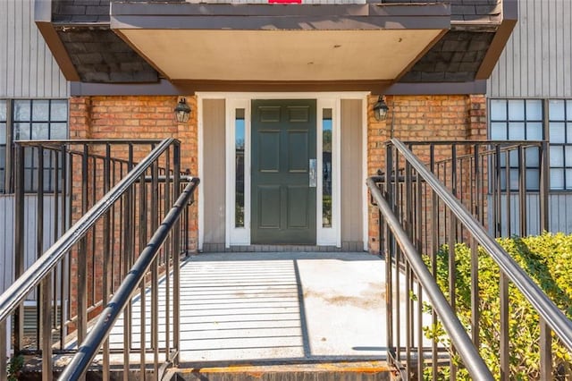 365 Winding River Dr Unit # E, Atlanta, GA 30350 - view of exterior entry with brick siding