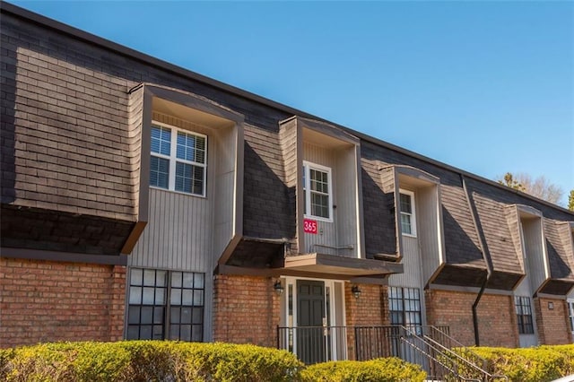 365 Winding River Dr Unit # E, Atlanta, GA 30350 - view of property exterior featuring brick siding