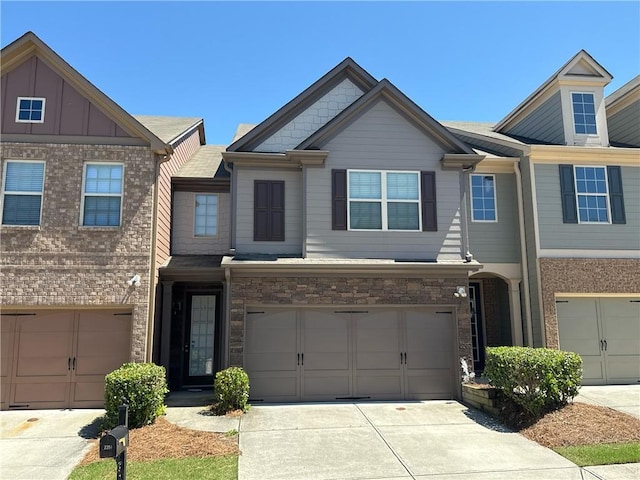 2351 Attewood Dr, Buford, GA 30519 - townhome / multi-family property with a garage and concrete driveway