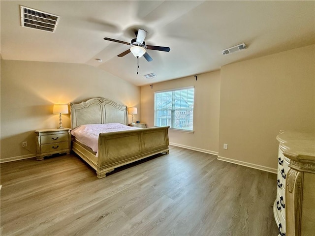 2351 Attewood Dr, Buford, GA 30519 - bedroom with light wood-style floors, baseboards, lofted ceiling, and a ceiling fan