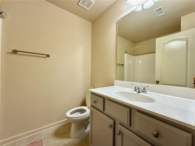 2351 Attewood Dr, Buford, GA 30519 - full bathroom with toilet, baseboards, vanity, and a shower