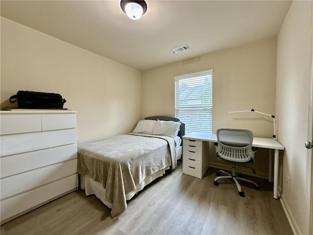 2351 Attewood Dr, Buford, GA 30519 - bedroom featuring light wood-type flooring and baseboards