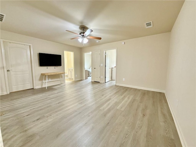 2351 Attewood Dr, Buford, GA 30519 - unfurnished living room with baseboards, light wood-type flooring, and ceiling fan