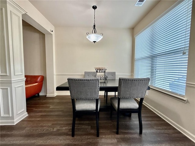 2351 Attewood Dr, Buford, GA 30519 - dining area with dark wood finished floors and baseboards