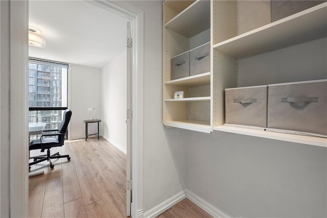 1280 W Peachtree St NW Unit 2409, Atlanta, GA 30309 - unfurnished office with wood finished floors and baseboards