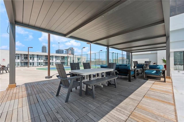 1280 W Peachtree St NW Unit 2409, Atlanta, GA 30309 - deck featuring outdoor dining space and an outdoor living space