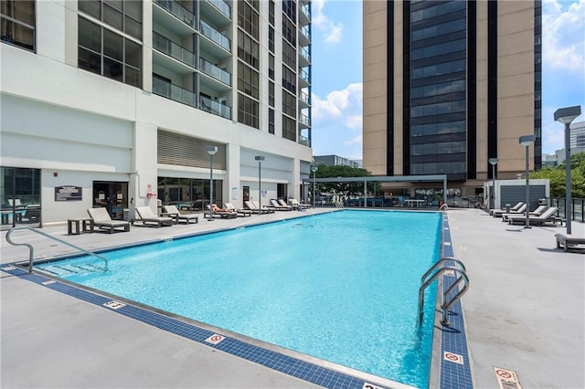 1280 W Peachtree St NW Unit 2409, Atlanta, GA 30309 - community pool with a patio
