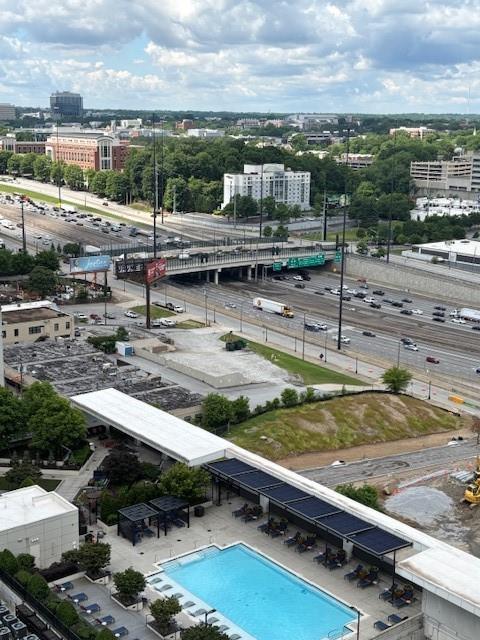 1280 W Peachtree St NW Unit 2409, Atlanta, GA 30309 - view of urban area featuring a pool area and a highway