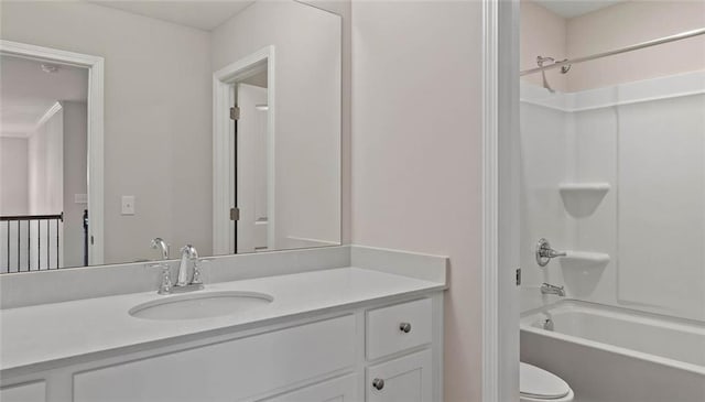full bathroom featuring vanity, toilet, and washtub / shower combination