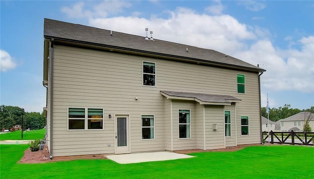 rear view of house with a patio area