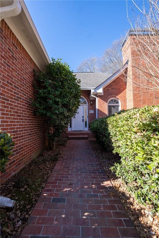 341 Little John Dr NW, Lilburn, GA 30047 - view of home's exterior with brick siding