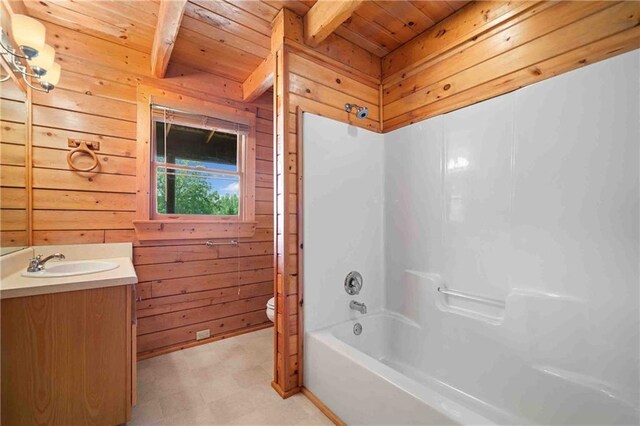 full bathroom with wood ceiling, wooden walls, and toilet