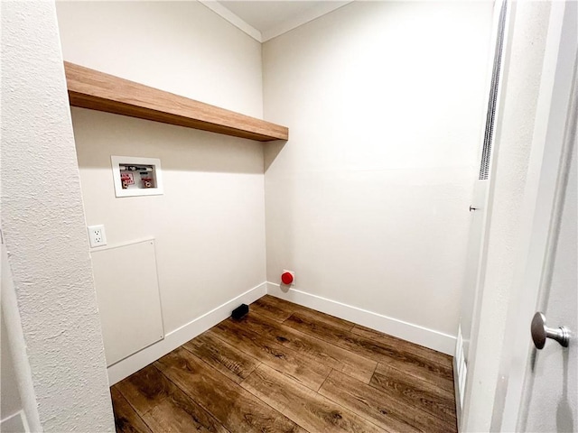 laundry room featuring laundry area, dark wood-style flooring, baseboards, hookup for a washing machine, and ornamental molding