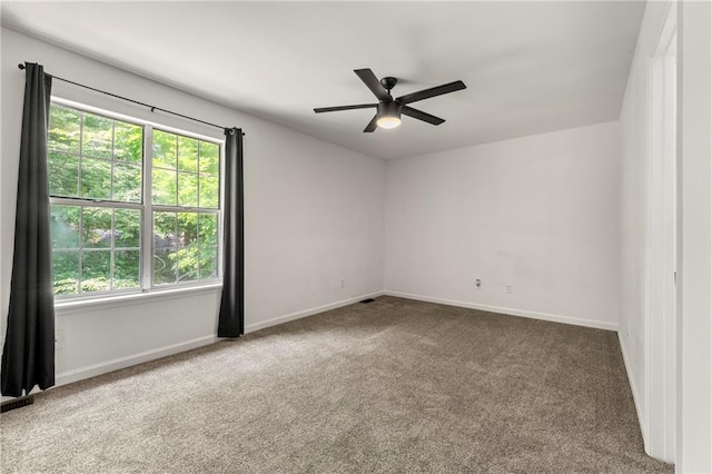 732 Jamestown Xing, Jonesboro, GA 30238 - spare room featuring carpet flooring and a ceiling fan