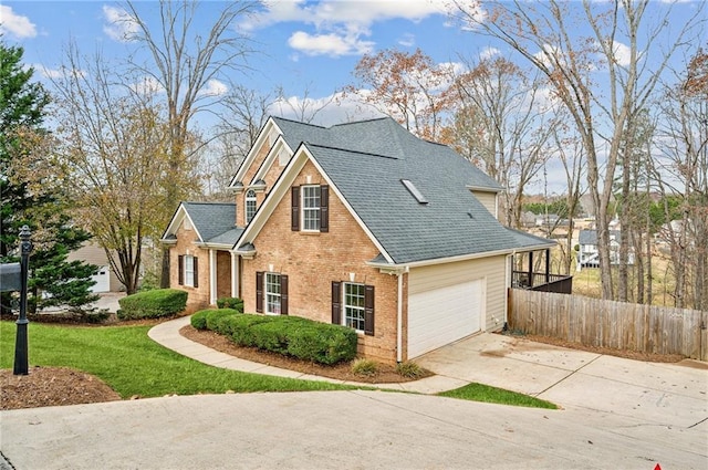 view of side of home with a garage